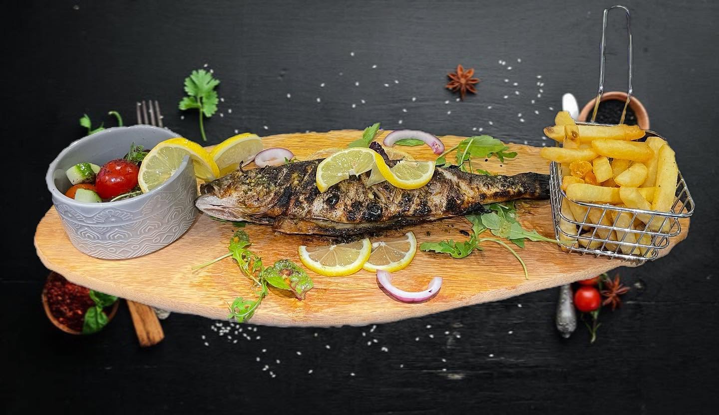 Ela restaurant's BBQ fish with fries in Stowmarket 